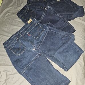 2 pair of Levi's womens mid-rise boot cut size 12M. Very nice jeans,